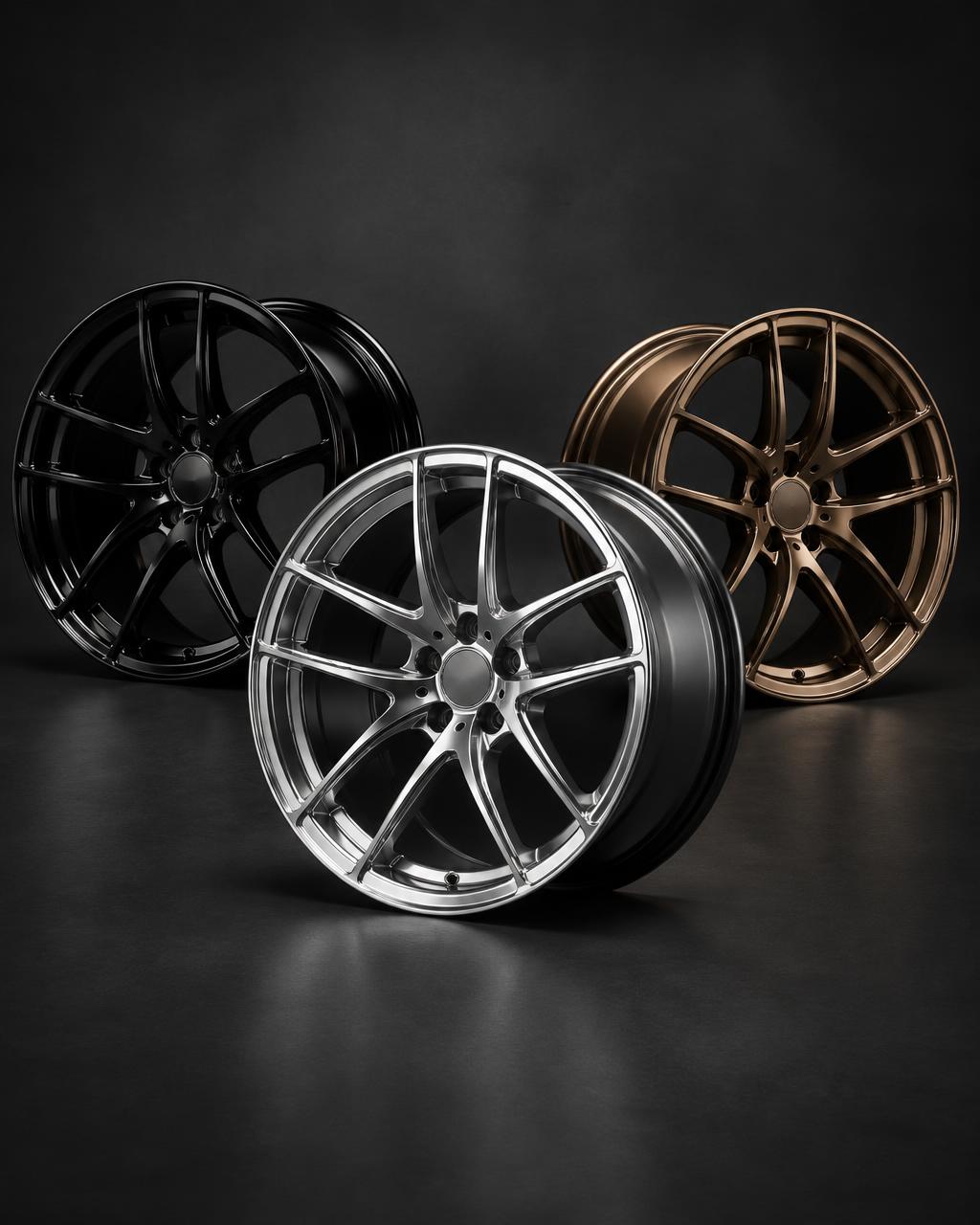 Three alloy wheels in gloss black, polished and bronze finishes
